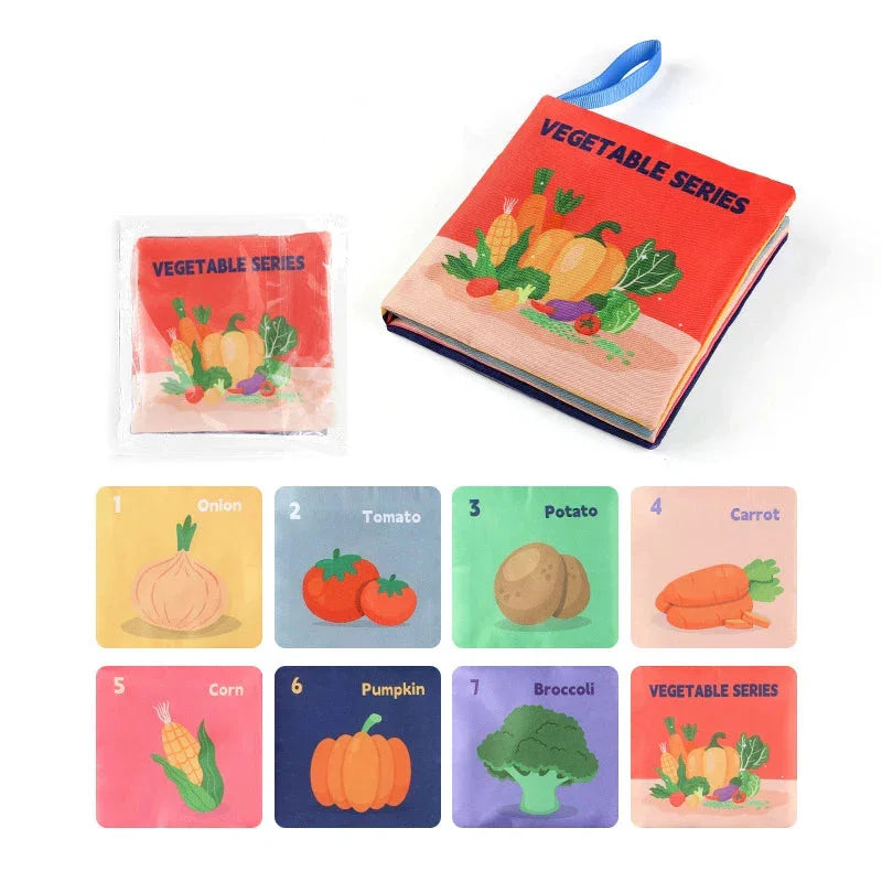 Soft fabric sensory book for kids with illustrated vegetable flashcards including onion, tomato, potato, carrot, corn, pumpkin, and broccoli.